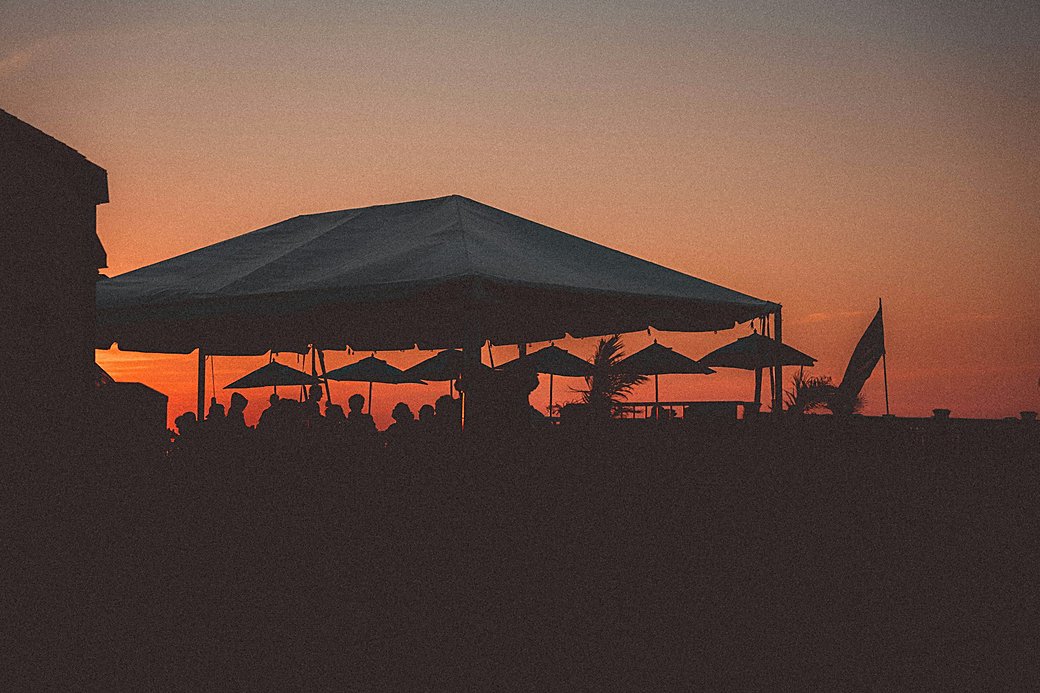 Beach restaurant at sunset