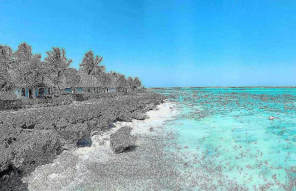 Snorkelling over a turquoise reef in Zanzibar